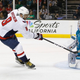 Martin Jones of the San Jose Sharks makes a glove save on a shot by Alex Ovechkin of the Washington Capitals on March 10, 2021.